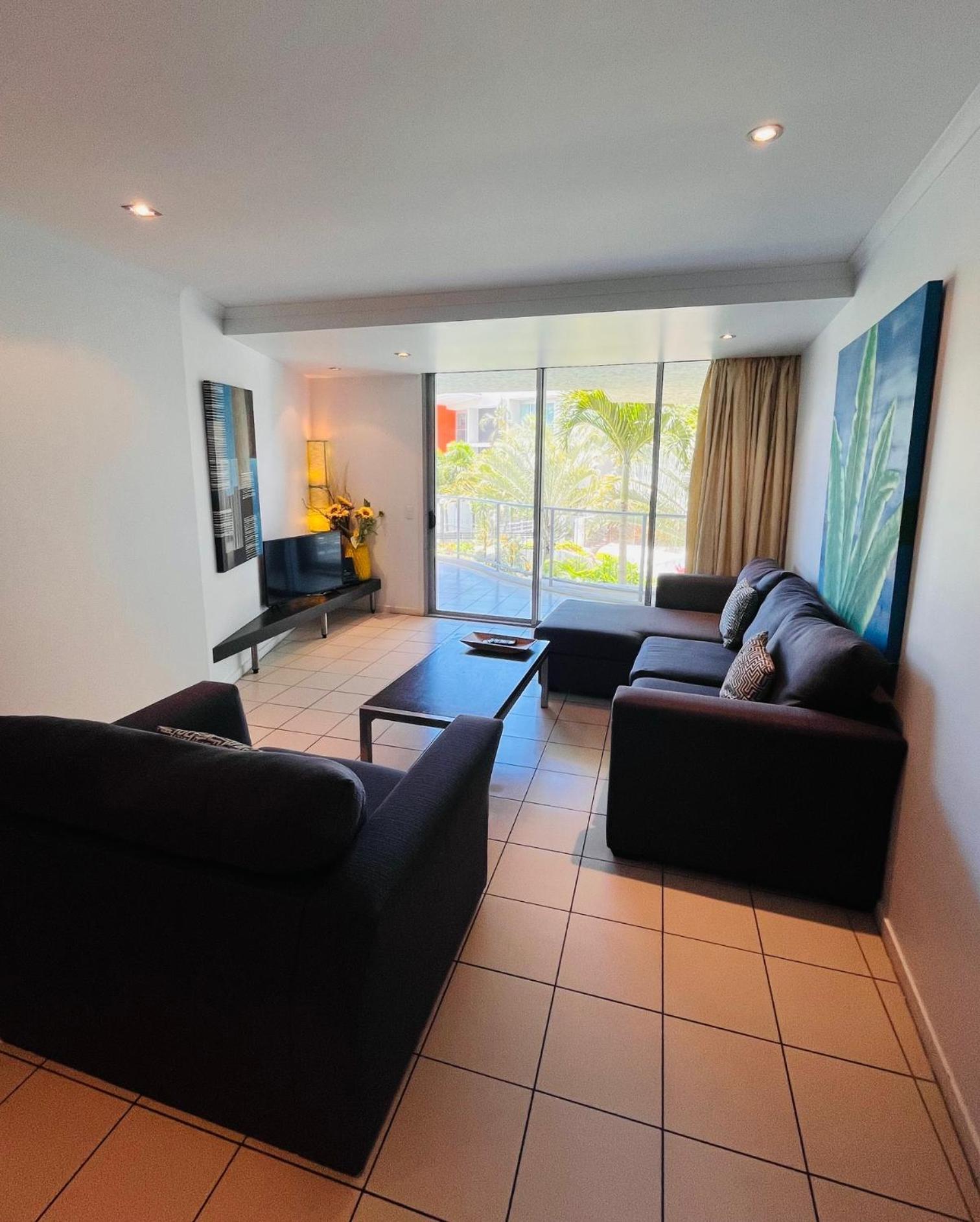 At Marina Shores Airlie Beach Εξωτερικό φωτογραφία Living room
